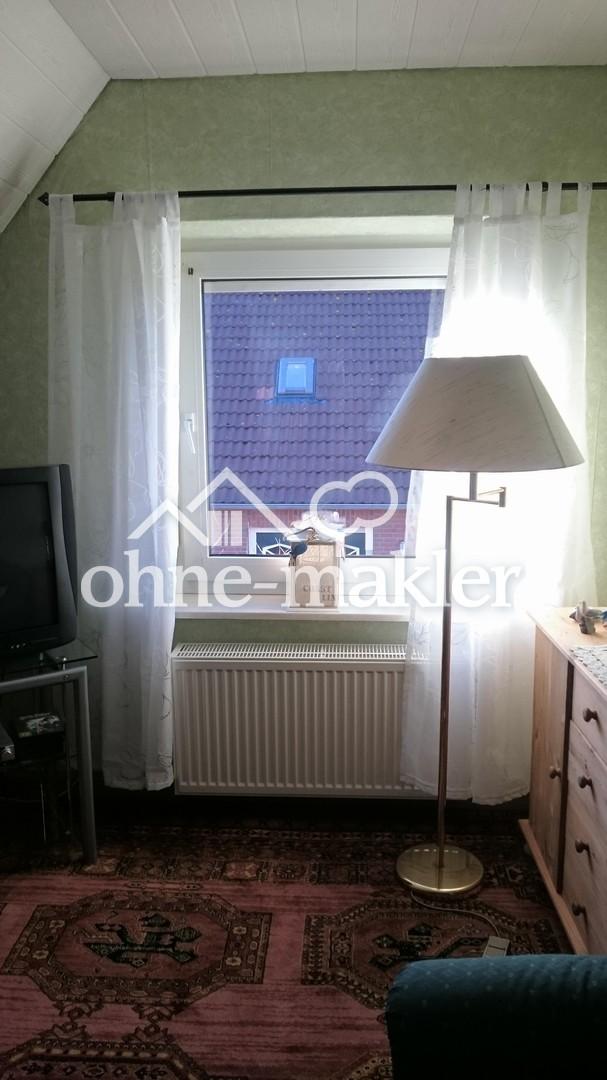 Wohnzimmer obere Wohnung