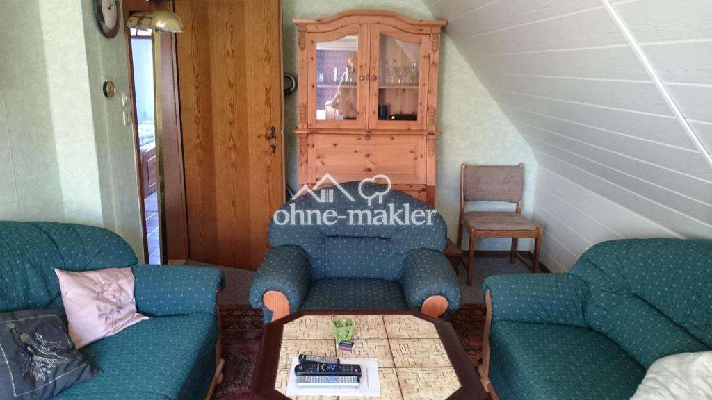 Wohnzimmer obere Wohnung