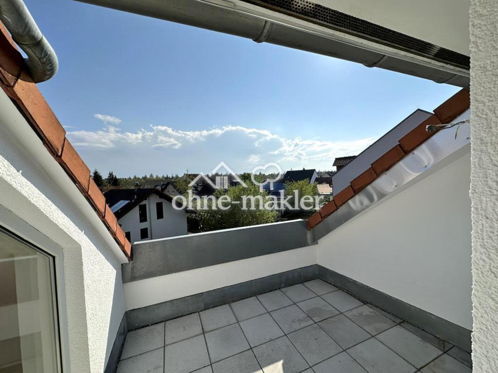 Dachwohnung (2.OG) mit EBK, Dachterrasse + Stellplatz in angenehmer Lage von Kirrlach! - Photo 4