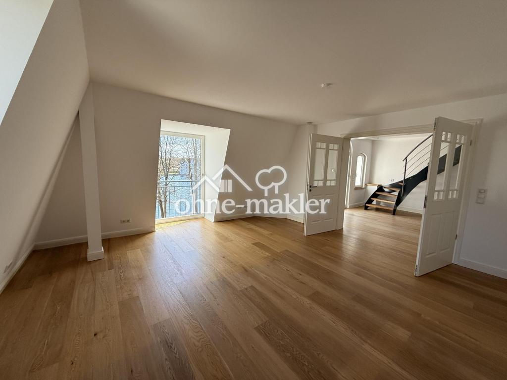 Exklusive Dachgeschosswohnung mit Schloss- und Seeblick in repräsentativer Villa - Photo 1