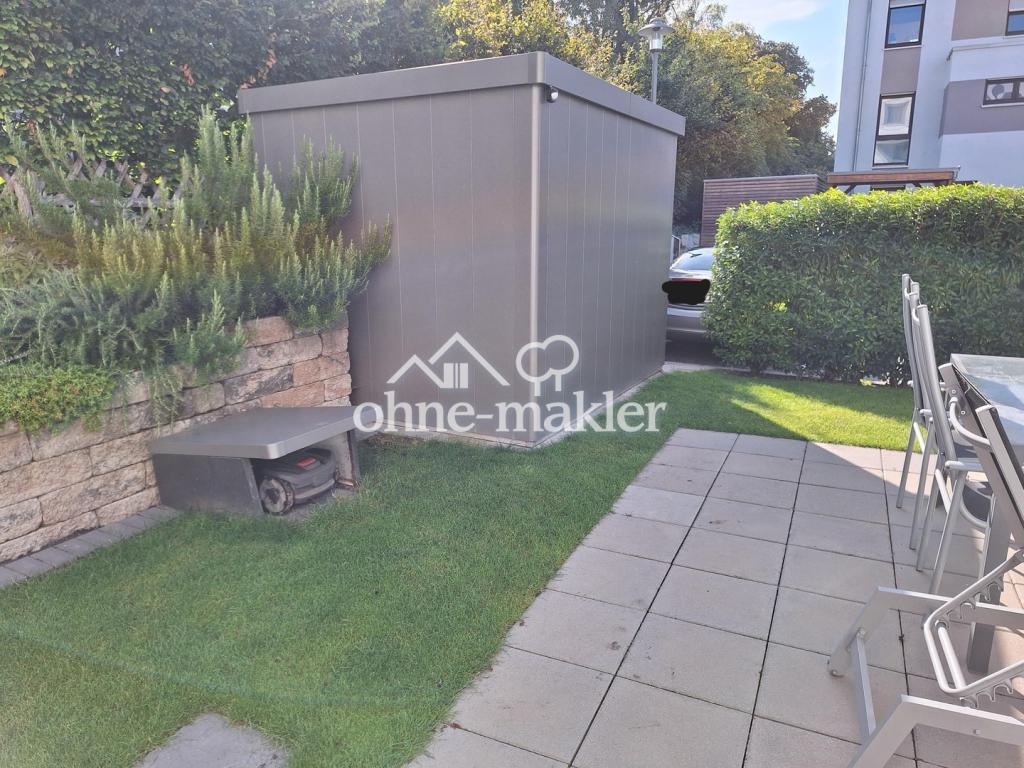 Gartenhaus mit Mähroboter