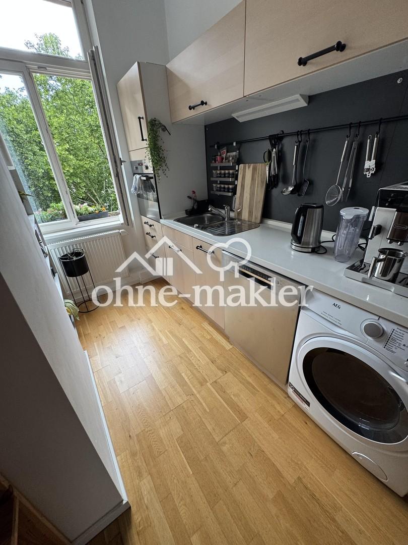 Schöne modernisierte Altbauwohnung mit Dielen und EBK, nähe Theater - Foto 4