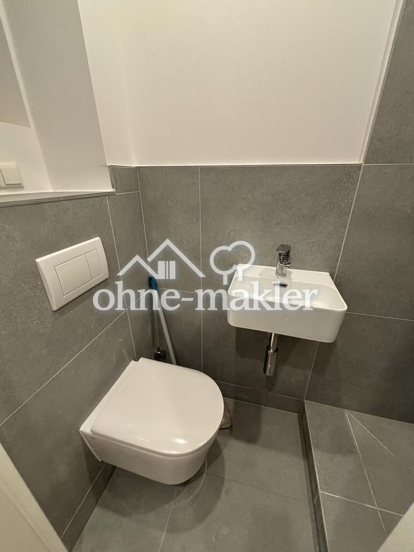 Zentrale, hochwertig kernsanierte Wohnung mit zwei Zimmern und neuer Einbauküche - Photo 4