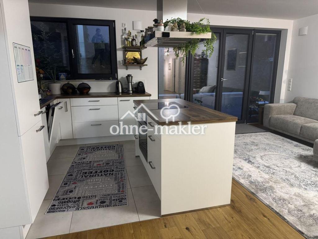 Luxuriöse 4-Zimmer Erdgeschosswohnung mit Garten - Foto 4