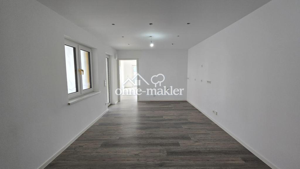 Erdgeschosswohnung mit Garage und Garten, kernsaniert mit gehobener Ausstattung im Erstbezug - Photo 2