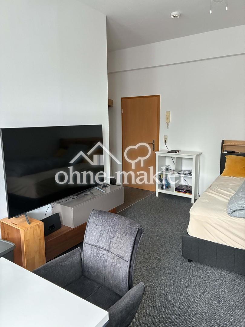 Gepflegtes, helles Apartment stadtnah und verkehrsgünstig gelegen, teilmöbliert - Photo 1