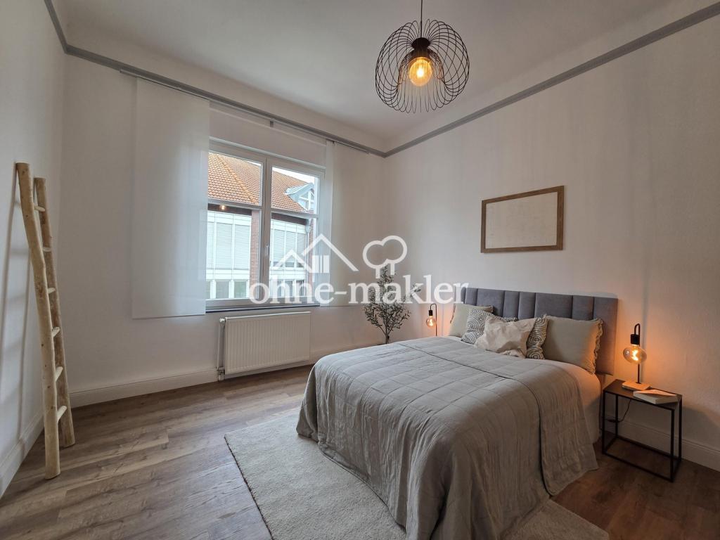 Lichtdurchflutete 3,5 Zimmer Altbauwohnung mit Einbauküche und eigenem Gartenanteil - Foto 5