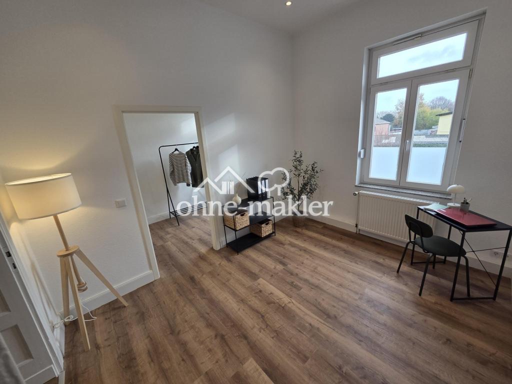Lichtdurchflutete 3,5 Zimmer Altbauwohnung mit Einbauküche und eigenem Gartenanteil - Foto 4
