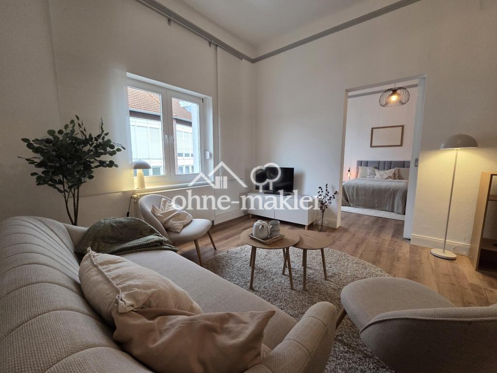 Lichtdurchflutete 3,5 Zimmer Altbauwohnung mit Einbauküche und eigenem Gartenanteil - Foto 2