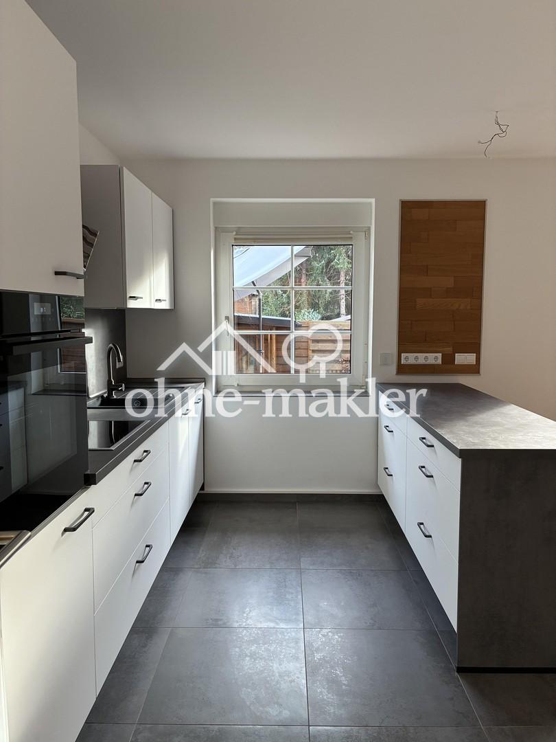 Stillvolle 2-Zimmer-Erdgeschosswohnung mit Südterrasse und eigenem Garten - Foto 4