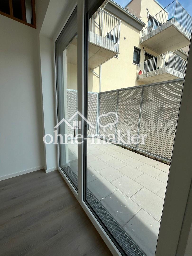 *Ein Monat mietfrei***Charmante 2-Zimmer-Wohnung mit Einbauküche und Terrasse G1-00-02 WE 0.45 - Photo 4
