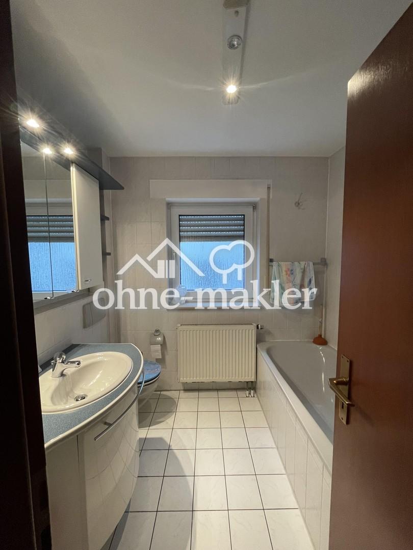 Gepflegte 2-Zimmer-Erdgeschosswohnung mit Balkon, Fußbodenheizung & Stellplatz - Foto 5