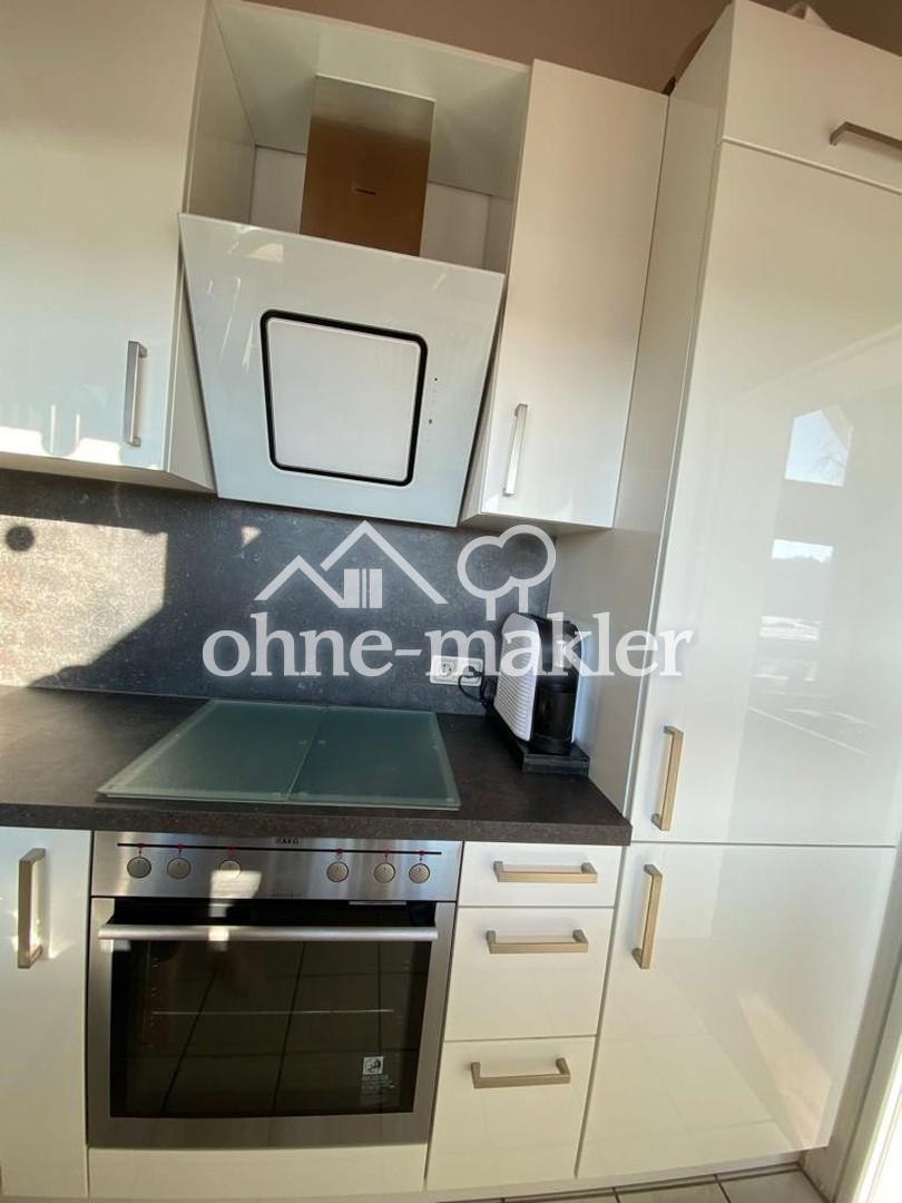 Schöne 2-Zimmer Maisonetten-Wohnung mit Einbauküche, Balkon und Tiefgaragenstellplatz - Photo 4