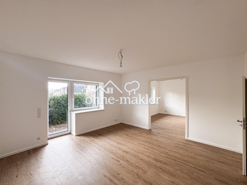 Moderne Hochparterre Terrassenwohnung mit eigenem Garten – Hochwertig energetisch saniert - Photo 2