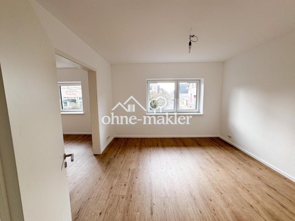 Moderne Hochparterre Terrassenwohnung mit eigenem Garten – Hochwertig energetisch saniert - Photo 4