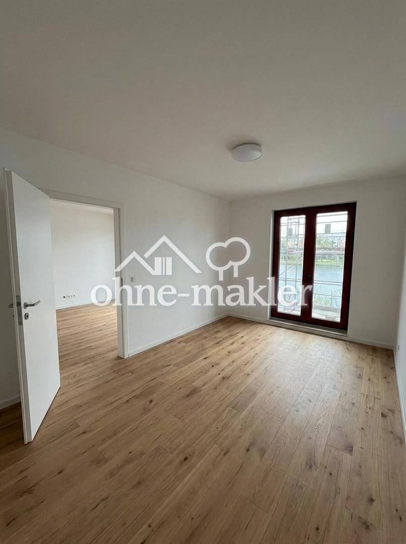 Erstbezug an der Dahme – 2-Zimmer-Neubau mit Südbalkon, Parkett und Fußbodenheizung (4) - Photo 2