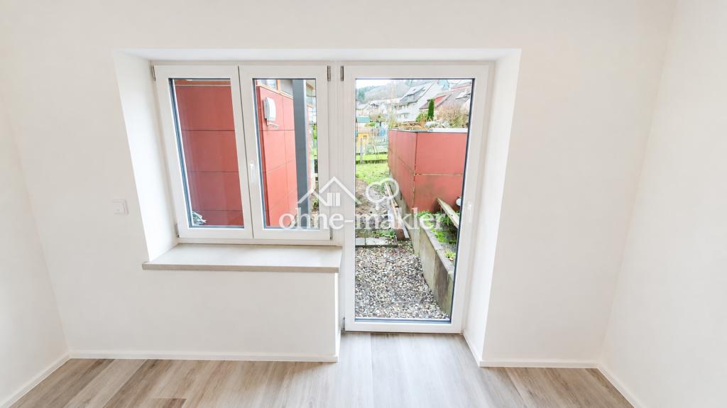 Kernsanierte Wohnung in Dorfmitte mit hochwertigem Ausbaustandard, moderner Küche und Terrasse - Foto 1