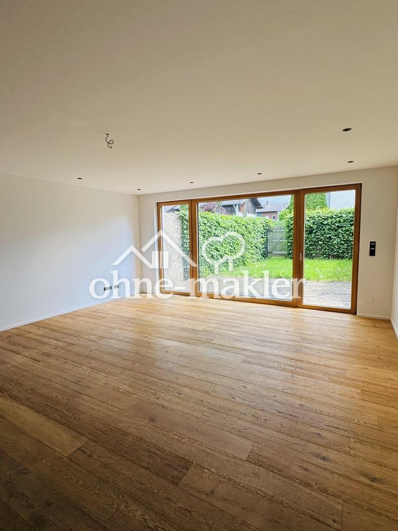 Modernes Mittelhaus mit Gartenanteil in familienfreundlicher Lage von Brannenburg - Foto 1