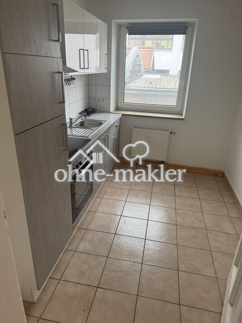 3- Zimmer-Hochparterre- Wohnung mit Einbauküche, Gemeinschaftsgarten und PKW Stellplatz - Foto 3