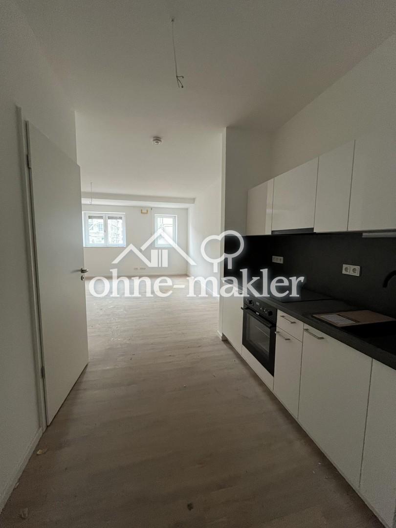 **einen Monat mietfrei wohnen** Erstbezug im Neubau 1-Zimmer-Wohnung mit Einbauküche E1-00-06 - Photo 4