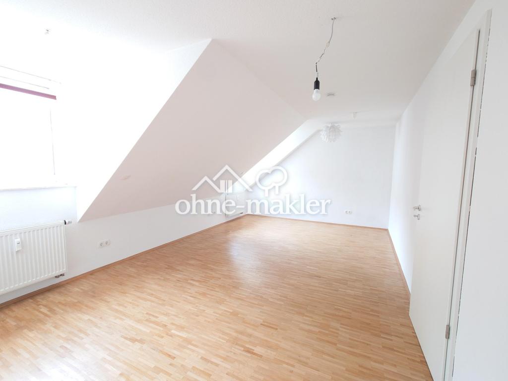 Zentral aber ruhig: Gemütliche Dachgeschosswohnung in der City - Foto 2