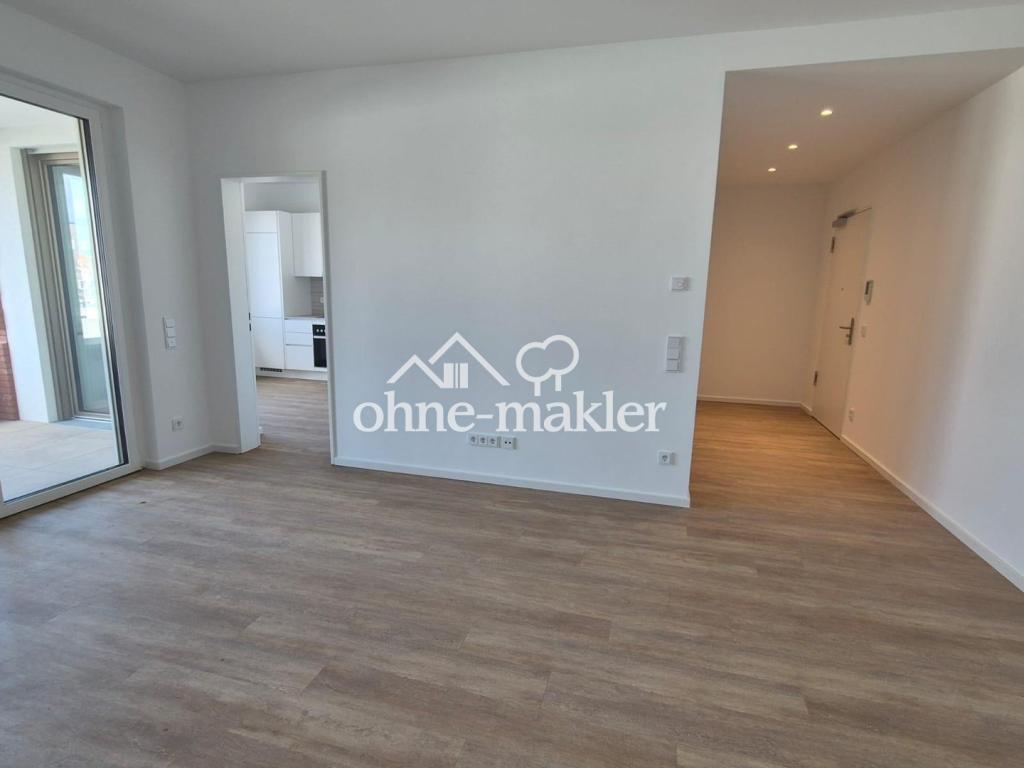 Hochwertiger Erstbezug: Lichtdurchflutete Neubauwohnung mit West-Loggia & neuer Einbauküche - Foto 1