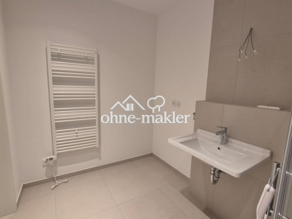 Hochwertiger Erstbezug: Lichtdurchflutete Neubauwohnung mit West-Loggia & neuer Einbauküche - Foto 4