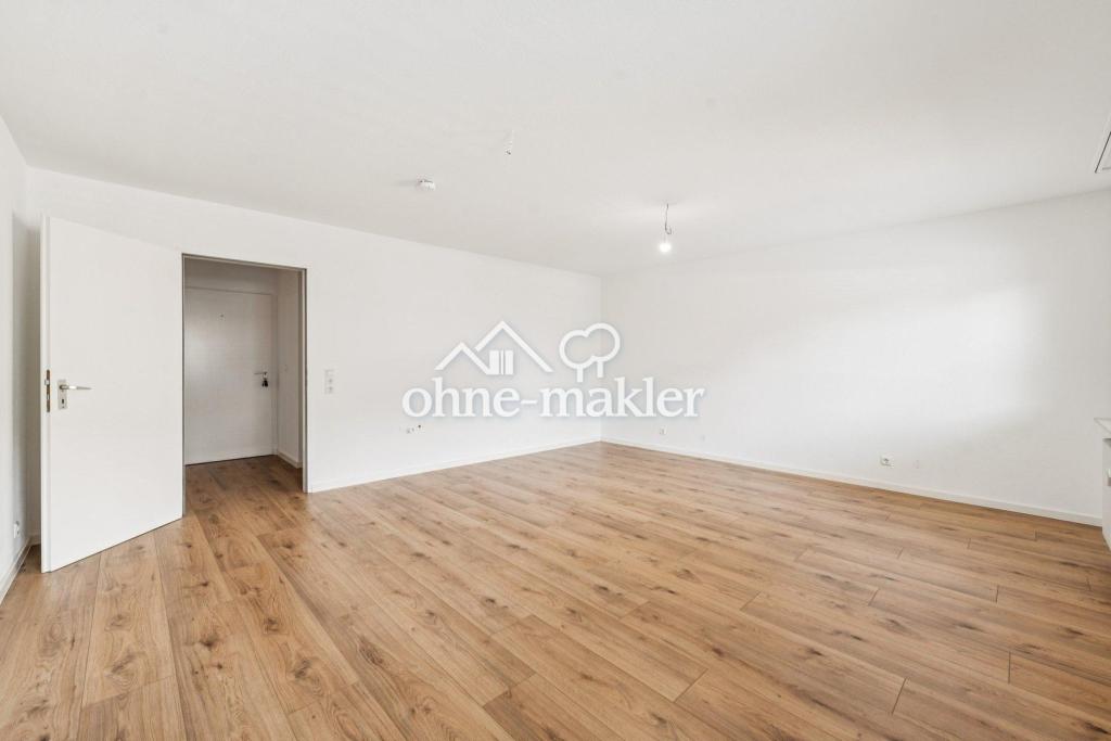 Erstbezug nach Kernsanierung: 2,5-Zi.-Wohnung mit Balkon und TG-Stellplatz (+Aufzug) - Photo 2
