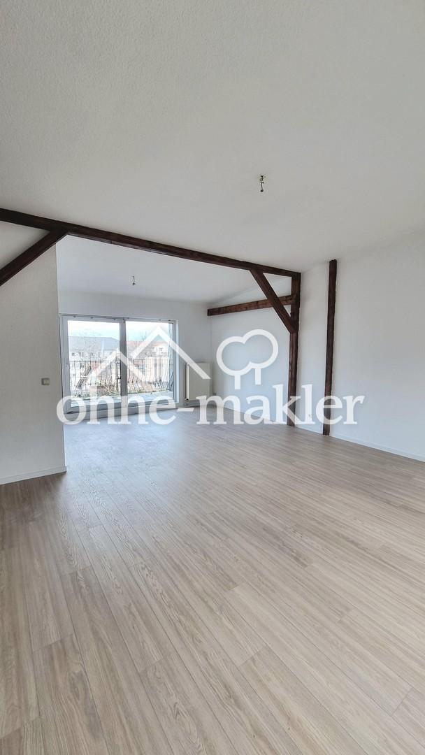 Charmante 2-Zimmer-Dachgeschosswohnung mit großer Terrasse - Foto 1