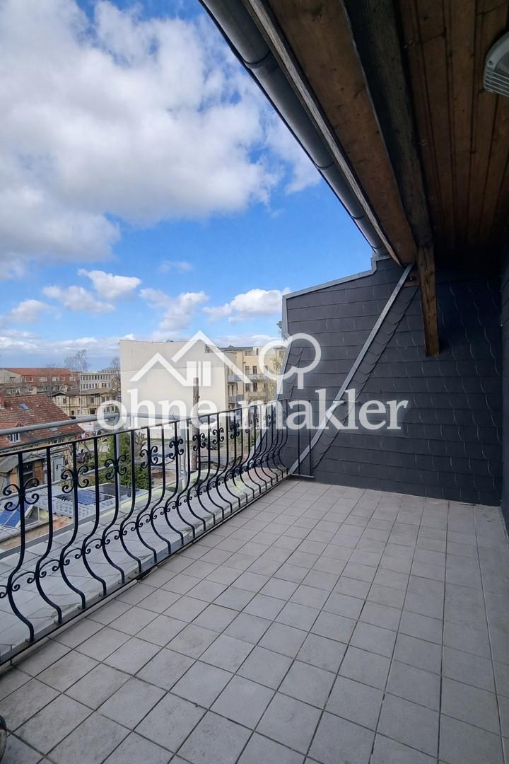 Charmante 2-Zimmer-Dachgeschosswohnung mit großer Terrasse - Foto 4