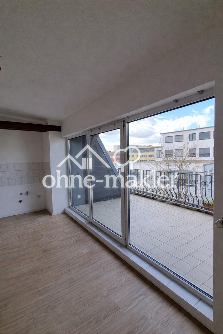 Charmante 2-Zimmer-Dachgeschosswohnung mit großer Terrasse - Foto 5