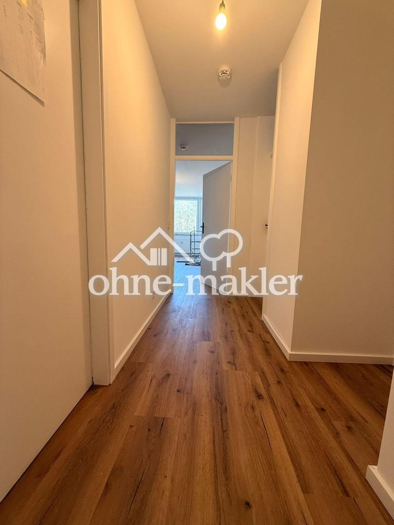 2-Zimmer-Wohnung - Balkon ins Grüne, Aufzug, Einbauküche - Erstbezug nach umfassender Renovierung - Foto 1