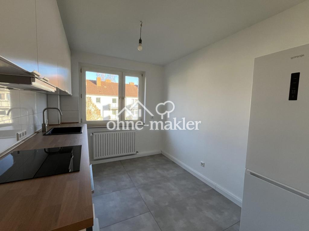 Erstbezug nach Renovierung - 2 Zimmer mit Einbauküche und Balkon - Foto 4