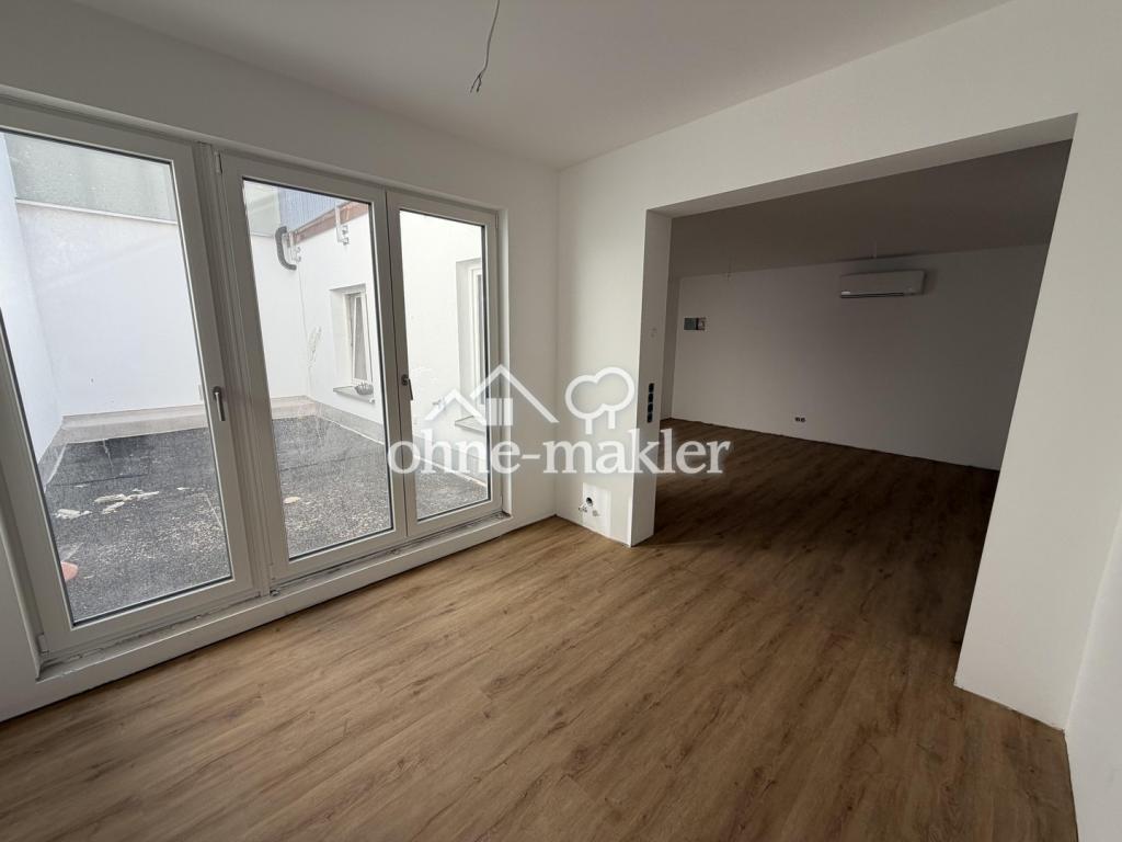 Großzügige 3-Zimmer-Wohnung mit Terrasse im Innenhof – Erstbezug – Wohnen in der Volkacher Altstadt - Foto 1