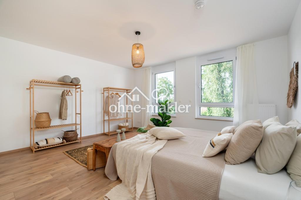 Exklusives Neubau-Reihenmittelhaus (KfW 40 QNG) mit PV-Anlage, Garten und moderner Einbauküche - Foto 1