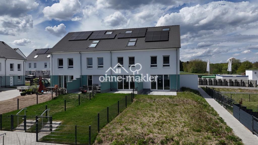 Exklusives Neubau-Reihenmittelhaus (KfW 40 QNG) mit PV-Anlage, Garten und moderner Einbauküche - Foto 1