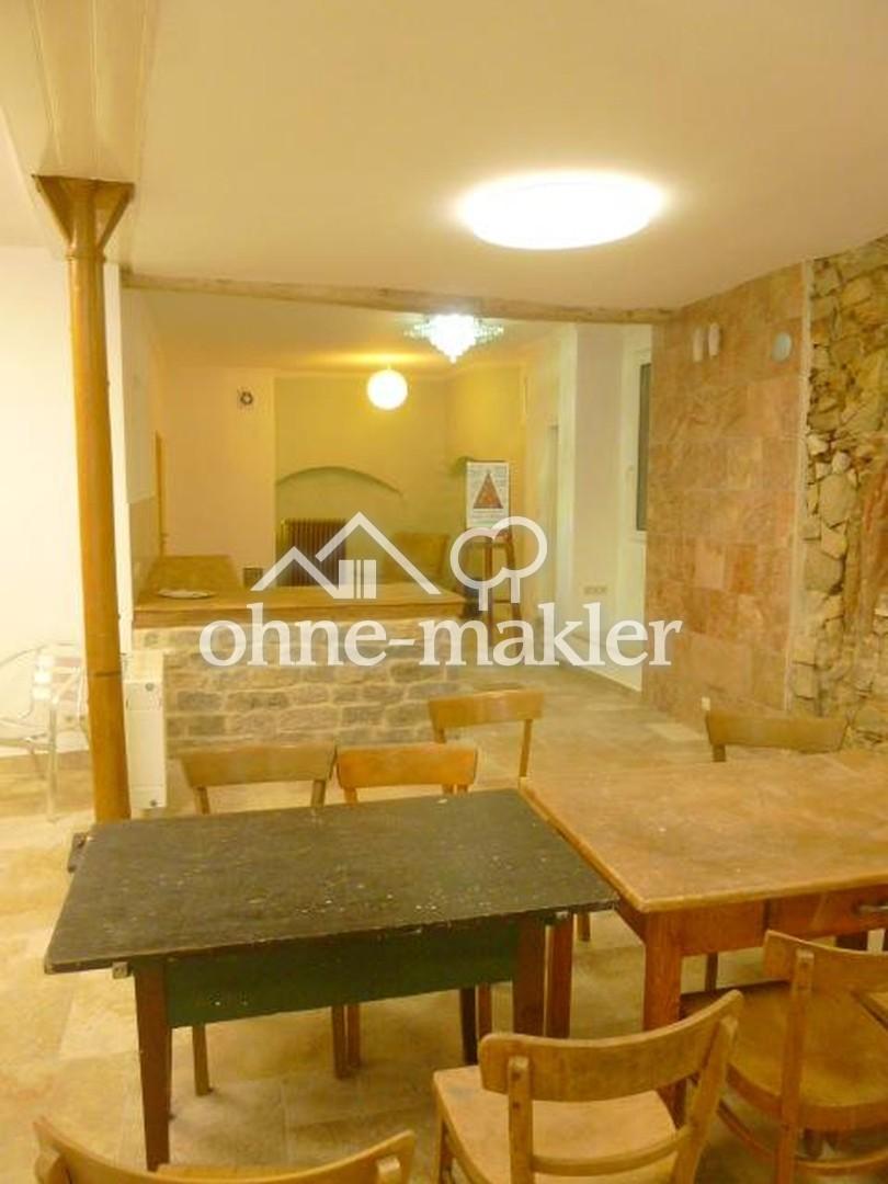 Charaktervolle EG-Wohnung mit Naturstein, Stuck und großzügiger Fensterfront - Photo 3