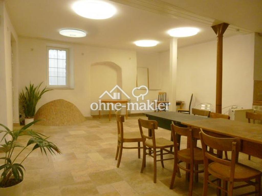 Charaktervolle EG-Wohnung mit Naturstein, Stuck und großzügiger Fensterfront - Photo 1