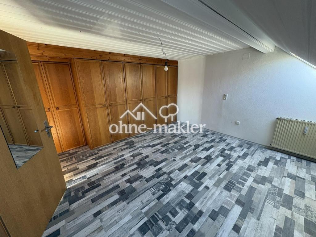 Geräumige und helle Altbauwohnung mit Dachterrasse in bester Karlsfelder Lage - Foto 4