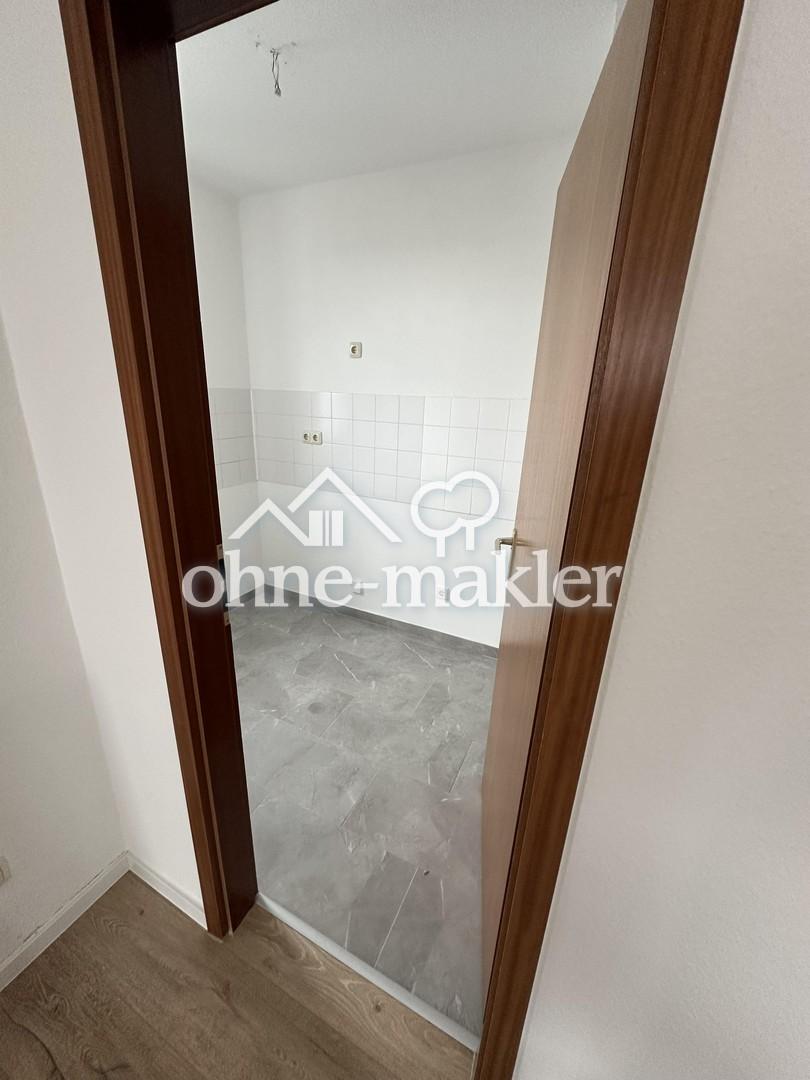 Helle renovierte Galeriewohnung mit Tiefgaragenstellplatz - Foto 4