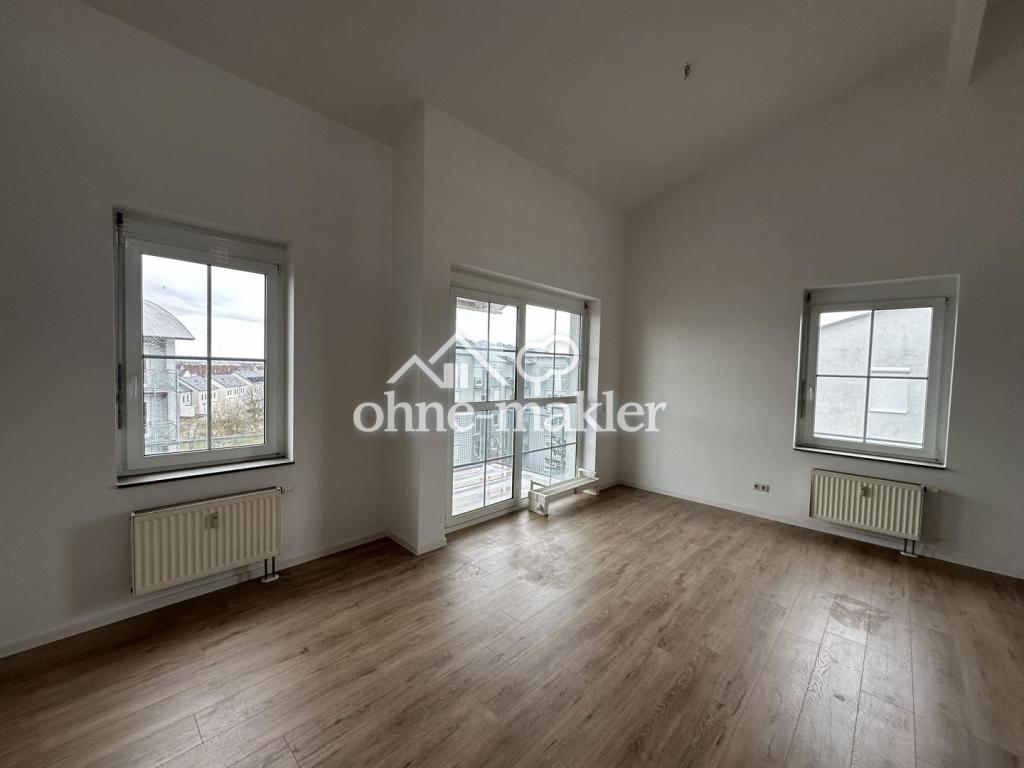 Helle renovierte Galeriewohnung mit Tiefgaragenstellplatz - Foto 2