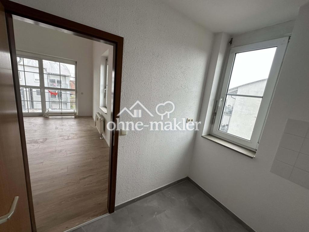 Helle renovierte Galeriewohnung mit Tiefgaragenstellplatz - Foto 4