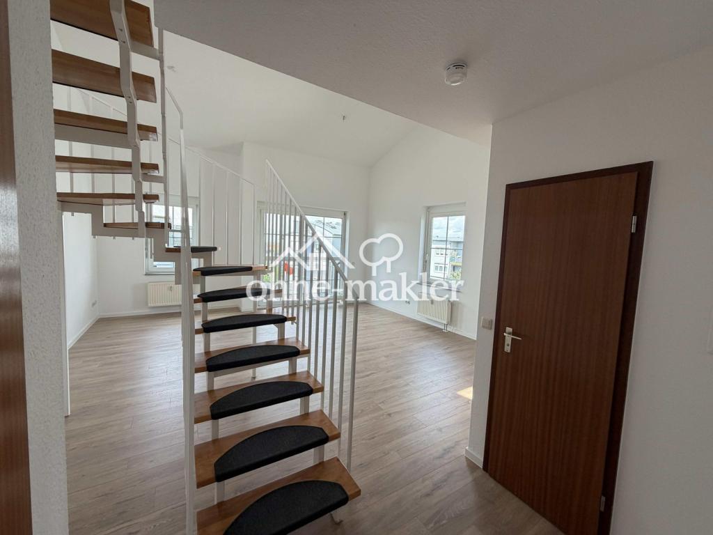 Helle renovierte Galeriewohnung mit Tiefgaragenstellplatz - Foto 3