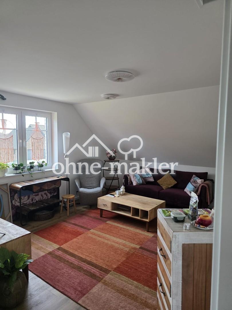 Oberwohnung mit Zugang zum Garten und kleiner Terrasse vor dem Haus - Photo 1