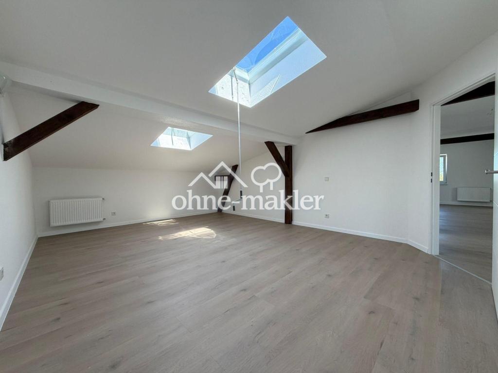 Schöne 3-Raum Dachgeschosswohnung mit zwei Keller und einem Stellplätzen im Herzen von Eberswalde - Foto 1