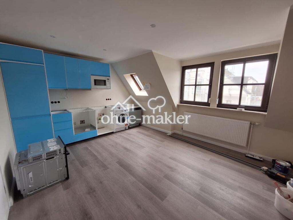 Erstbezug! Stilvolle 3-Zi Wohnung in Toplage von Rüdesheim mit Küche - Photo 2
