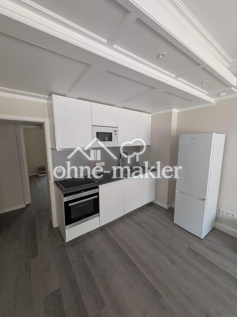 Erstbezug! Neue 2,5-Zi Wohnung in Toplage von Rüdesheim mit Einbauküche - Photo 2