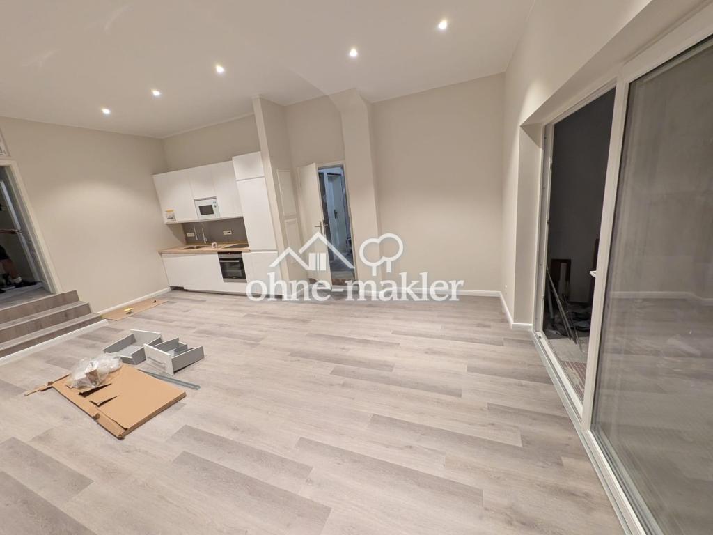 Erstbezug! Neue 2,5-Zi Wohnung in Toplage von Rüdesheim mit Einbauküche & Terrasse - Foto 1