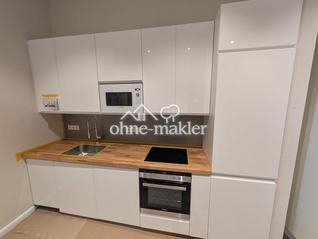 Erstbezug! Neue 2,5-Zi Wohnung in Toplage von Rüdesheim mit Einbauküche & Terrasse - Foto 2