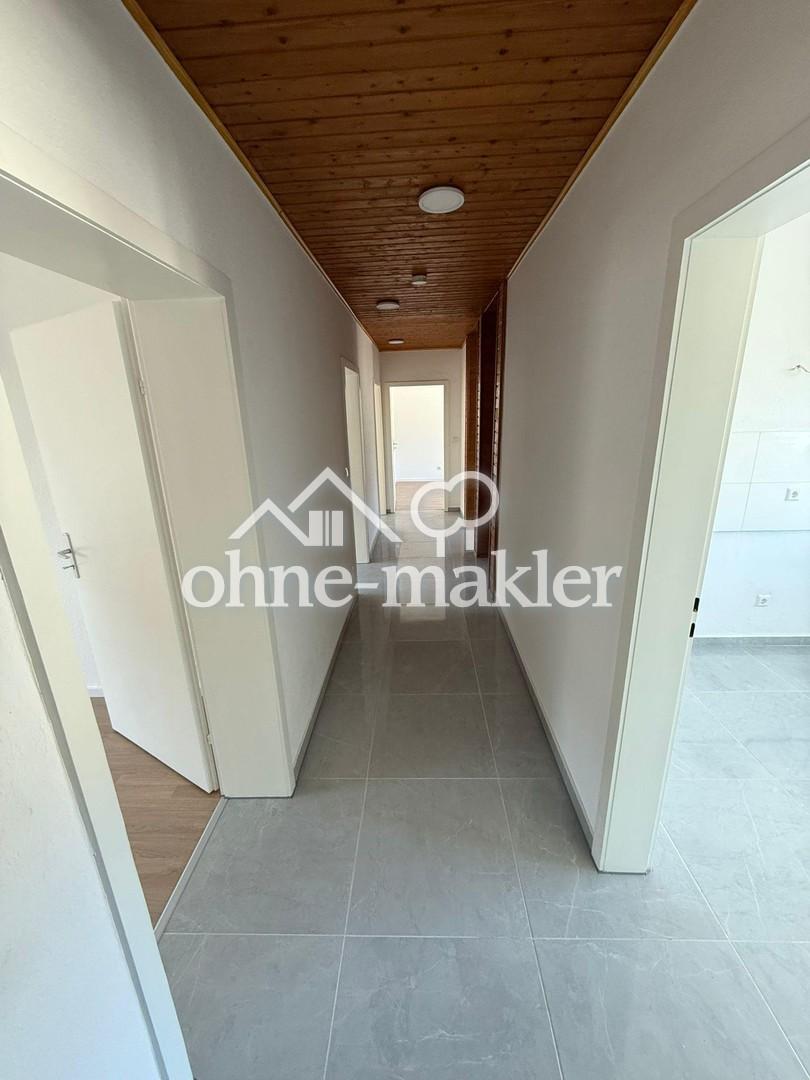 Erstbezug nach Kernsanierung – Sonnendurchflutete 4-Zimmer-Wohnung mit Balkon in Eggenstein - Photo 2